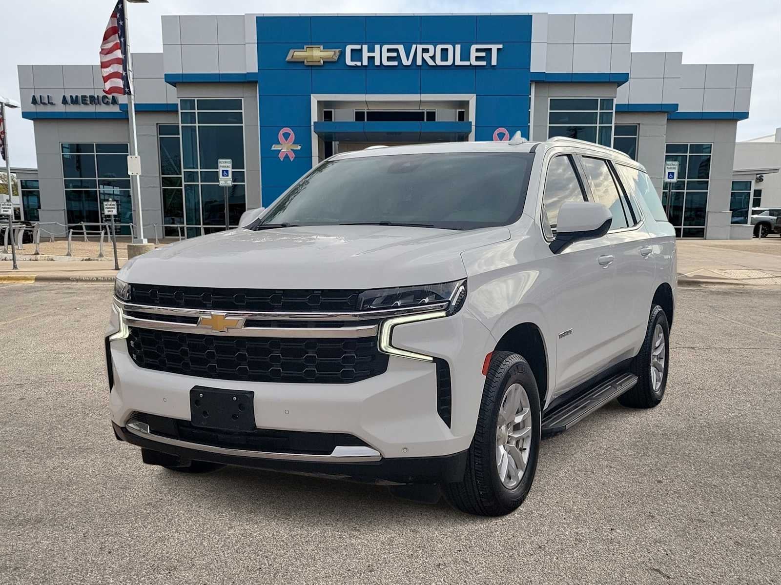 2023 Chevrolet Tahoe LS in Summit White — front three-quarter view