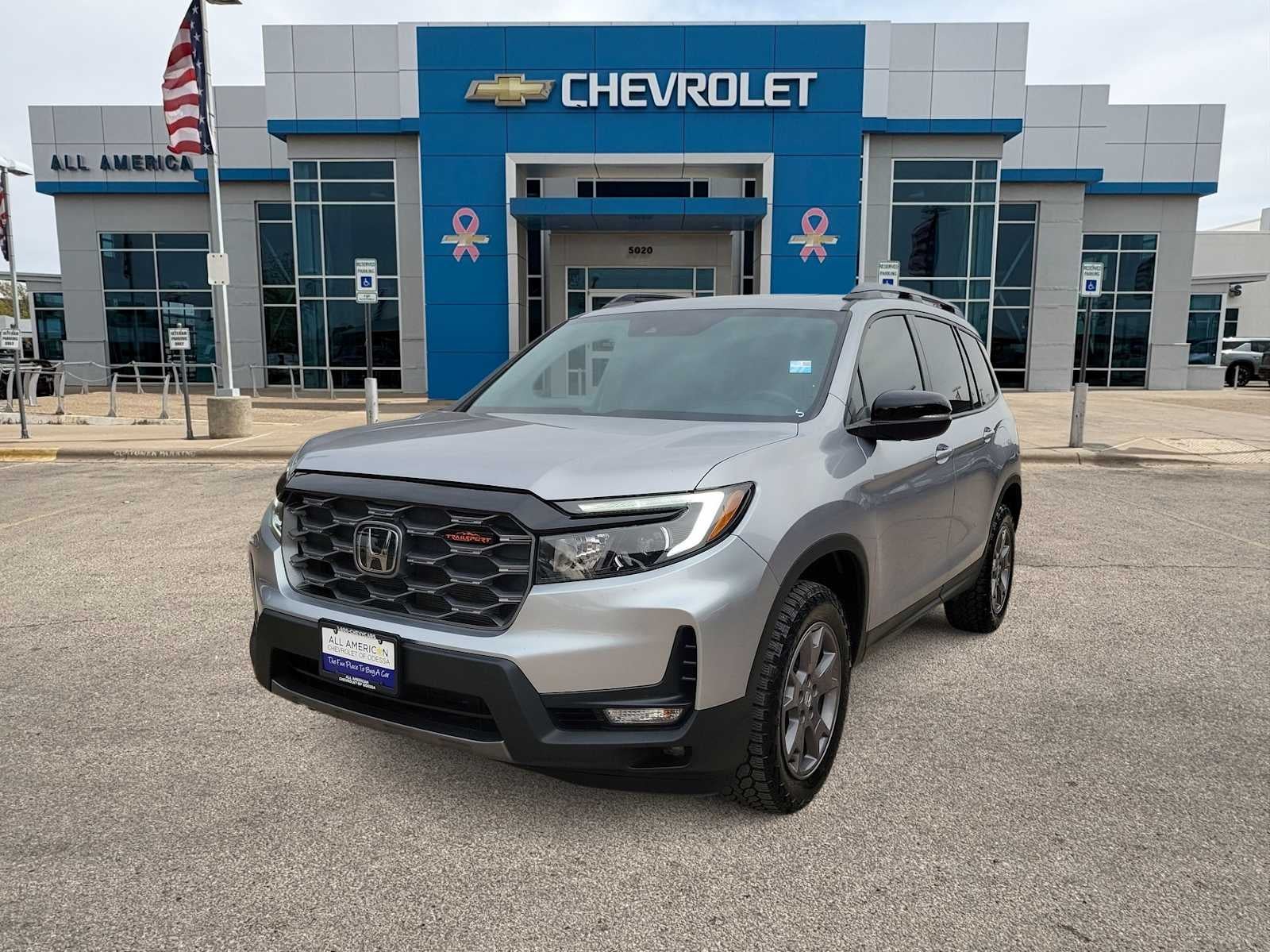 2024 Honda Passport TrailSport in Gray/Gray — front three-quarter view